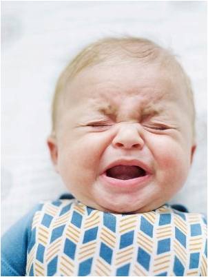 Baby crying with colic.